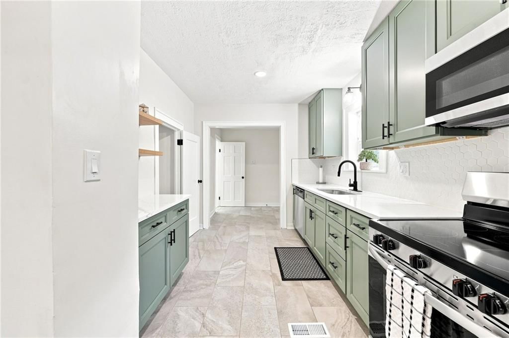 201 W 81st Terrace — photo 22