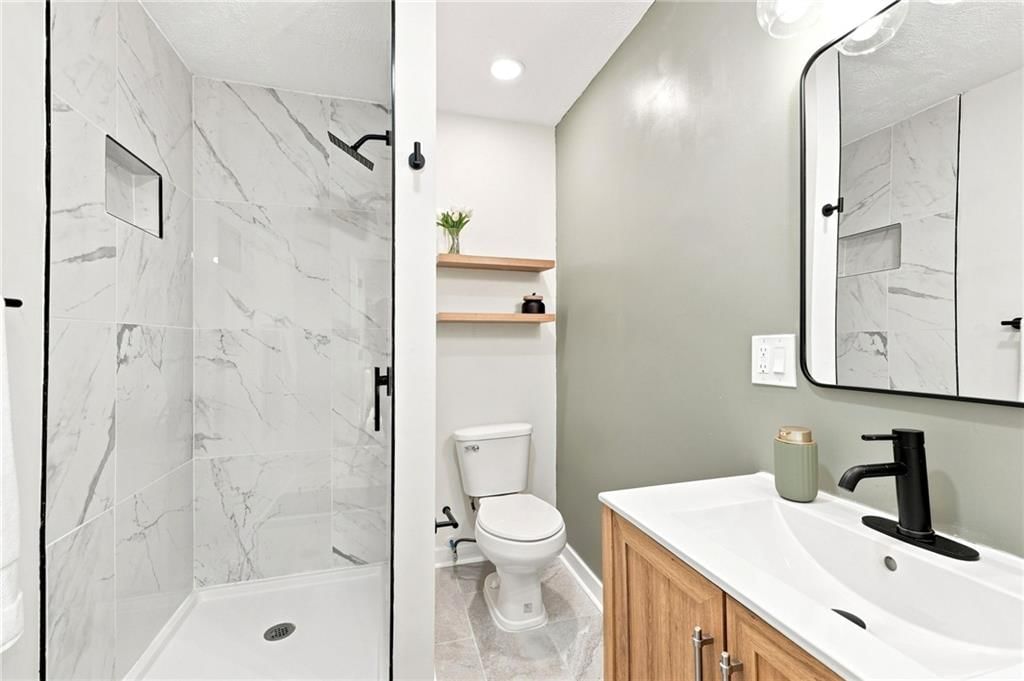 201 W 81st Terrace — photo 35