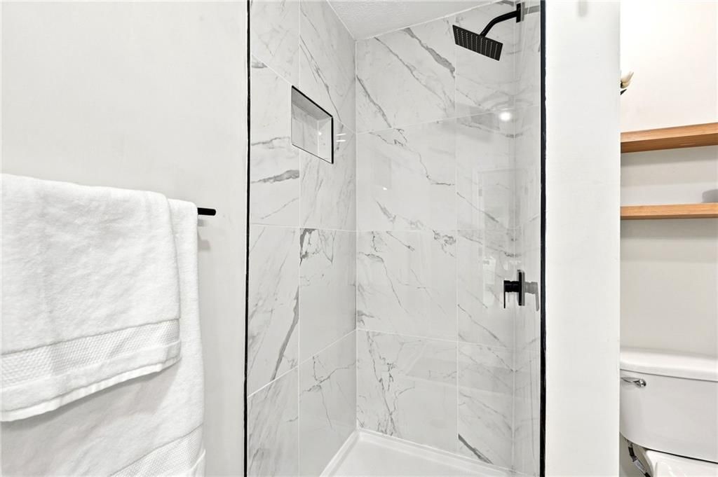 201 W 81st Terrace — photo 36