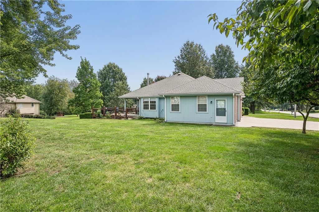 Big backyard and mature trees at 1707 Lynn Road, Excelsior Springs, MO 64024