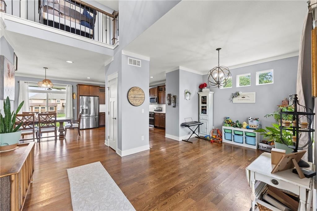 Hardwood floors at 1800 Knoll Creek Lane, Raymore, MO 64083