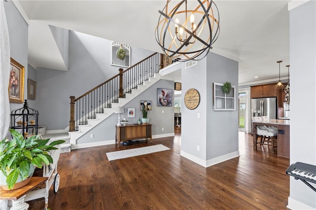 Tall ceilings and open floor plan at 1800 Knoll Creek Lane, Raymore, MO 64083