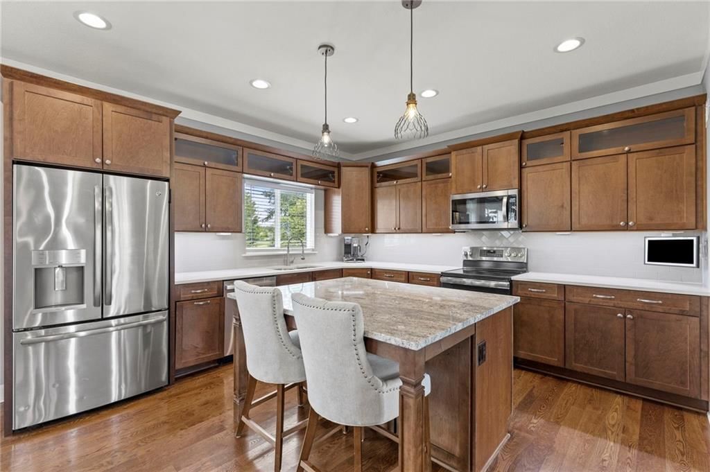 Photo 15 of 43 - 1800 Knoll Creek Lane, Raymore, MO 64083