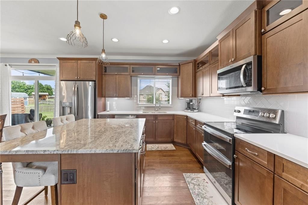 Photo 17 of 43 - 1800 Knoll Creek Lane, Raymore, MO 64083