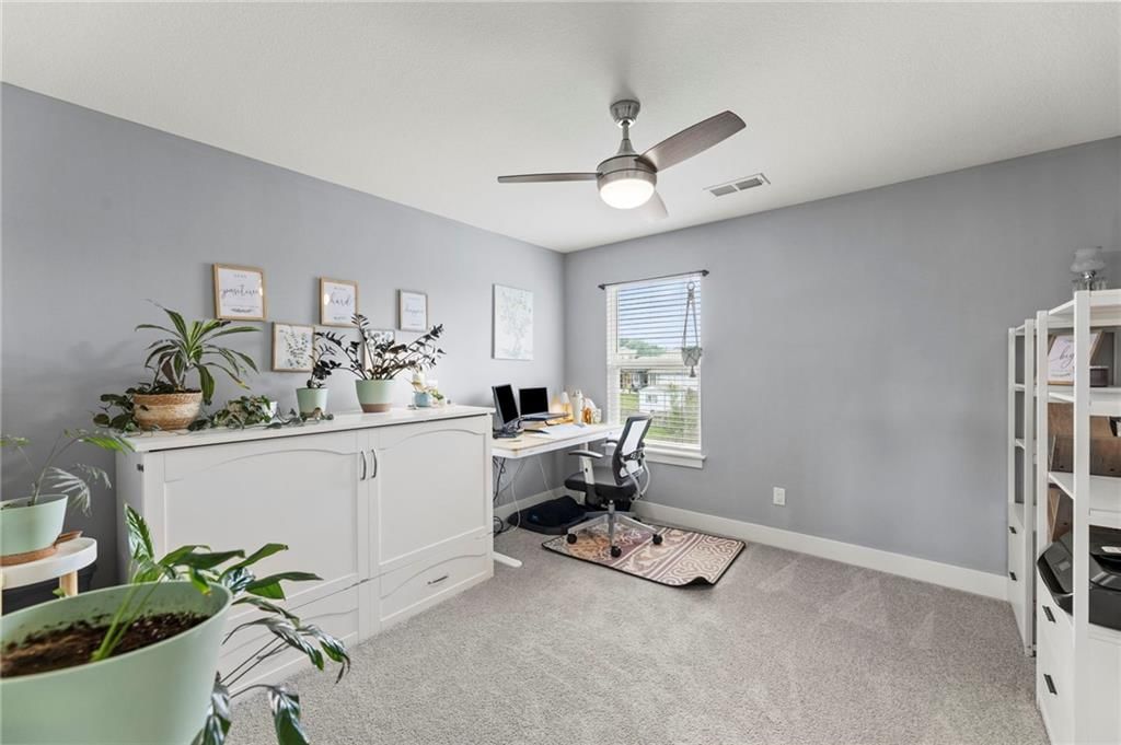 Photo 20 of 43 - 1800 Knoll Creek Lane, Raymore, MO 64083