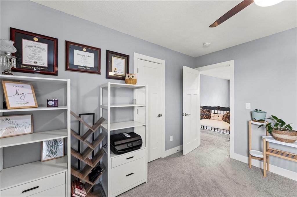 Photo 21 of 43 - 1800 Knoll Creek Lane, Raymore, MO 64083