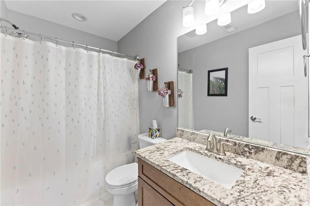 Photo 23 of 43 - 1800 Knoll Creek Lane, Raymore, MO 64083
