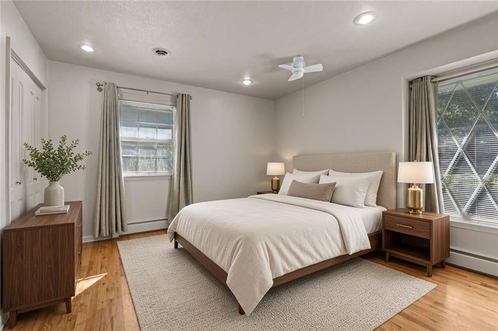 Main-floor primary bedroom at 1506 SW 6th Street, Lee's Summit, MO 64081