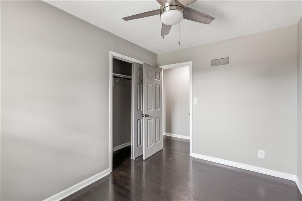Finished basement, fireplace and exposed brick wall at 11818 E 62nd Terrace, Kansas City, MO 64133