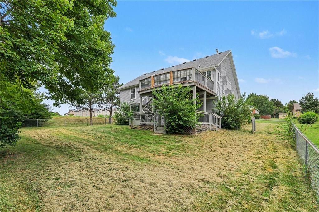 Fenced yard at 226 N Sunset Lane, Raymore, MO 64083