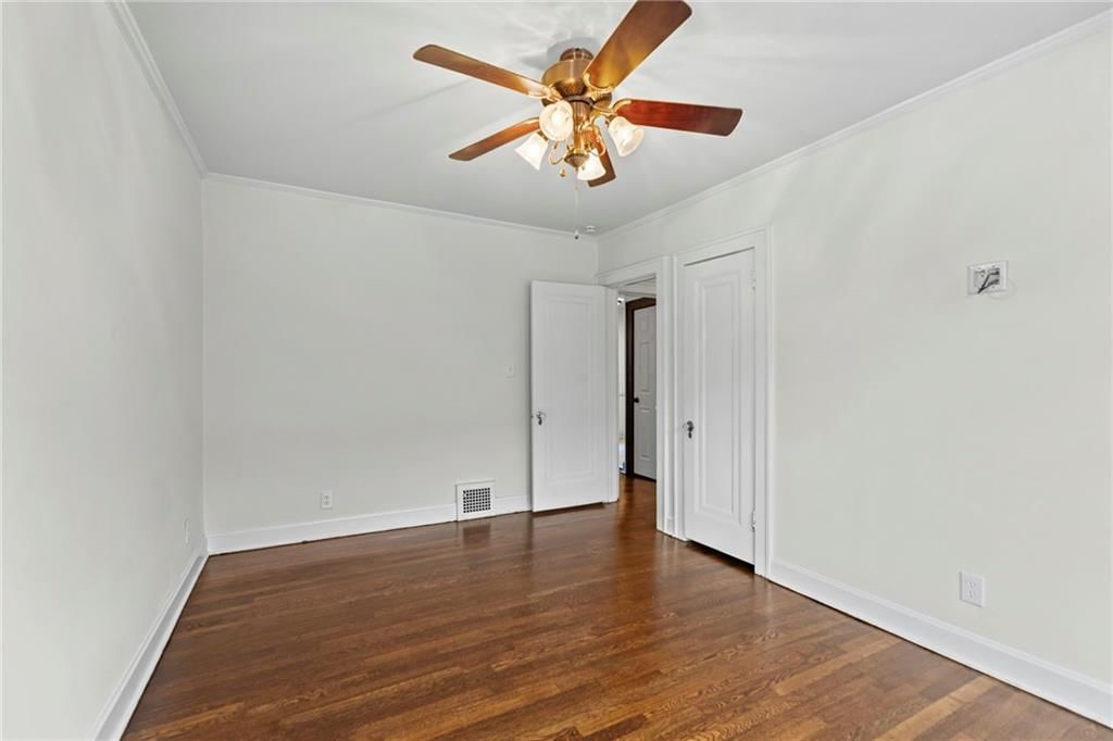 319 E 70th Terrace — photo 12
