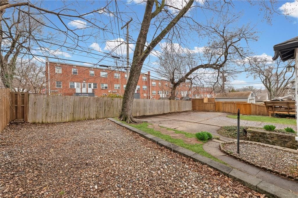 319 E 70th Terrace — photo 28