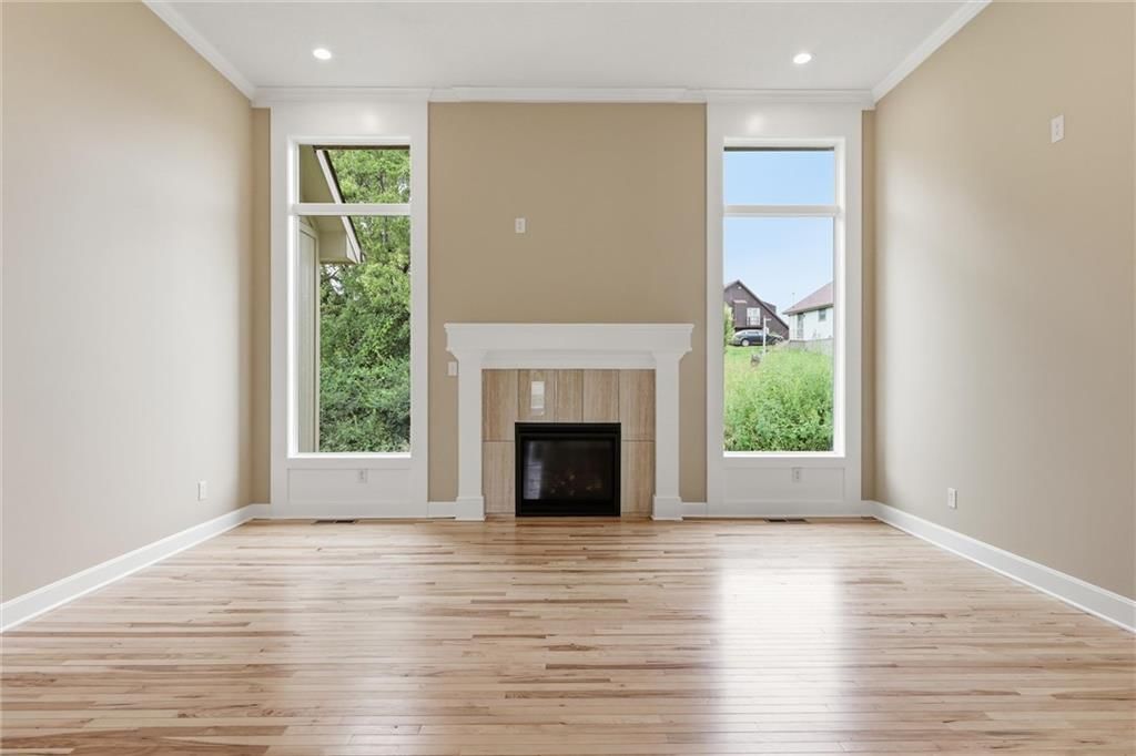 Tall ceilings, fireplace and open floor plan at 7402 Palmer Avenue, Kansas City, MO 64133