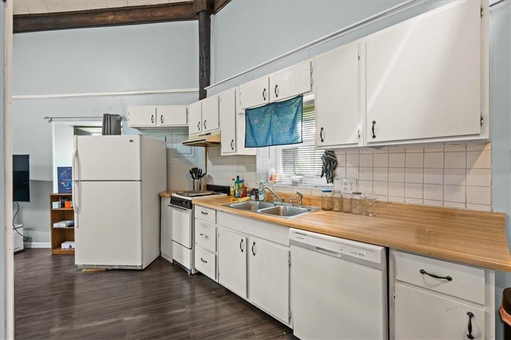 Modern, tall ceilings and open floor plan at 4011 - 4013 N Jackson Avenue, Kansas City, MO 64117