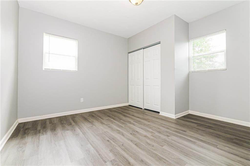 Main-floor primary bedroom at 807 N Ponca Drive, Independence, MO 64056