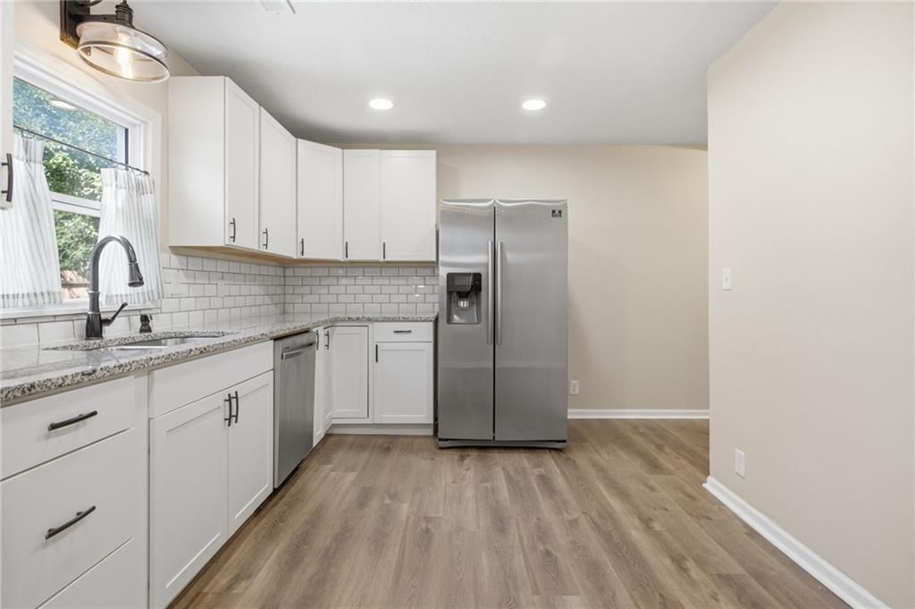 Photo 7 of 28 - 9022 Grand Avenue, Kansas City, MO 64114