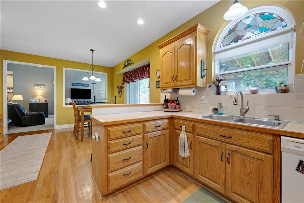 Photo 9 of 30 - 826 Trailway Drive, Raymore, MO 64083