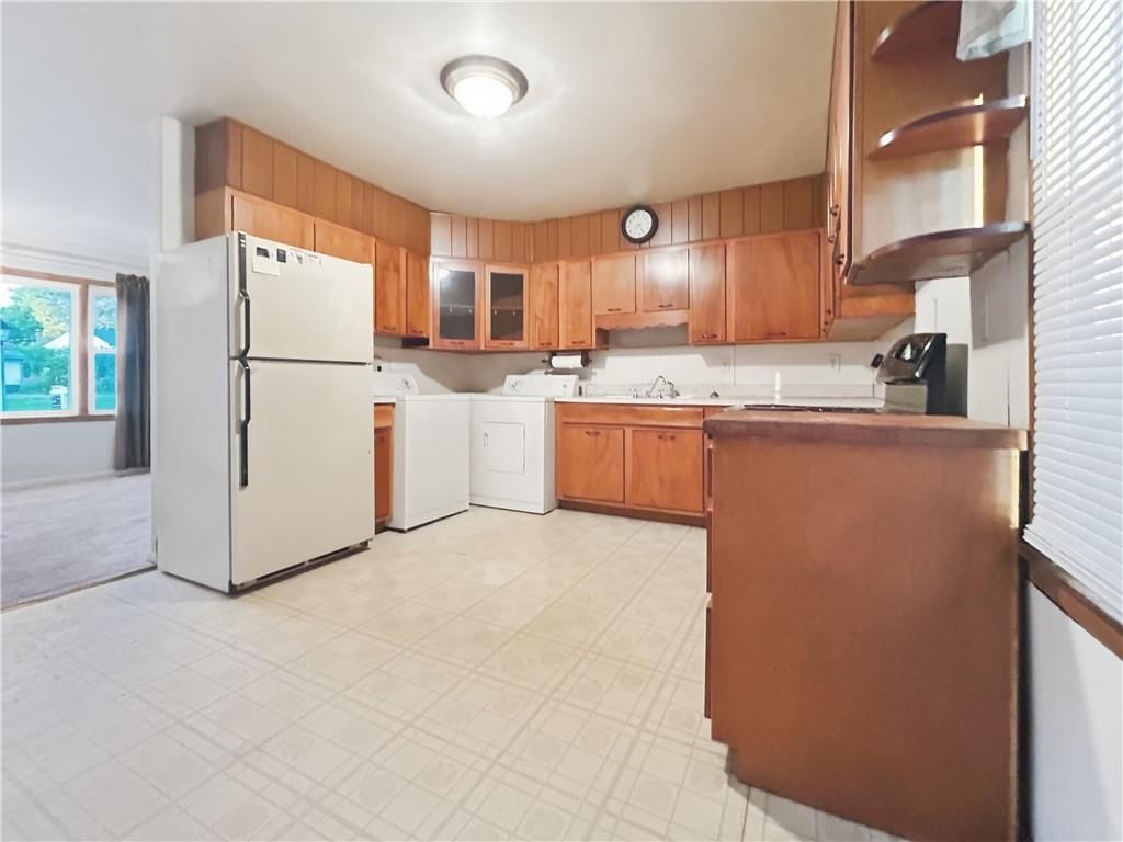 Open floor plan, kitchen island and recessed lighting at 505 NE 67th Terrace, Gladstone, MO 64118