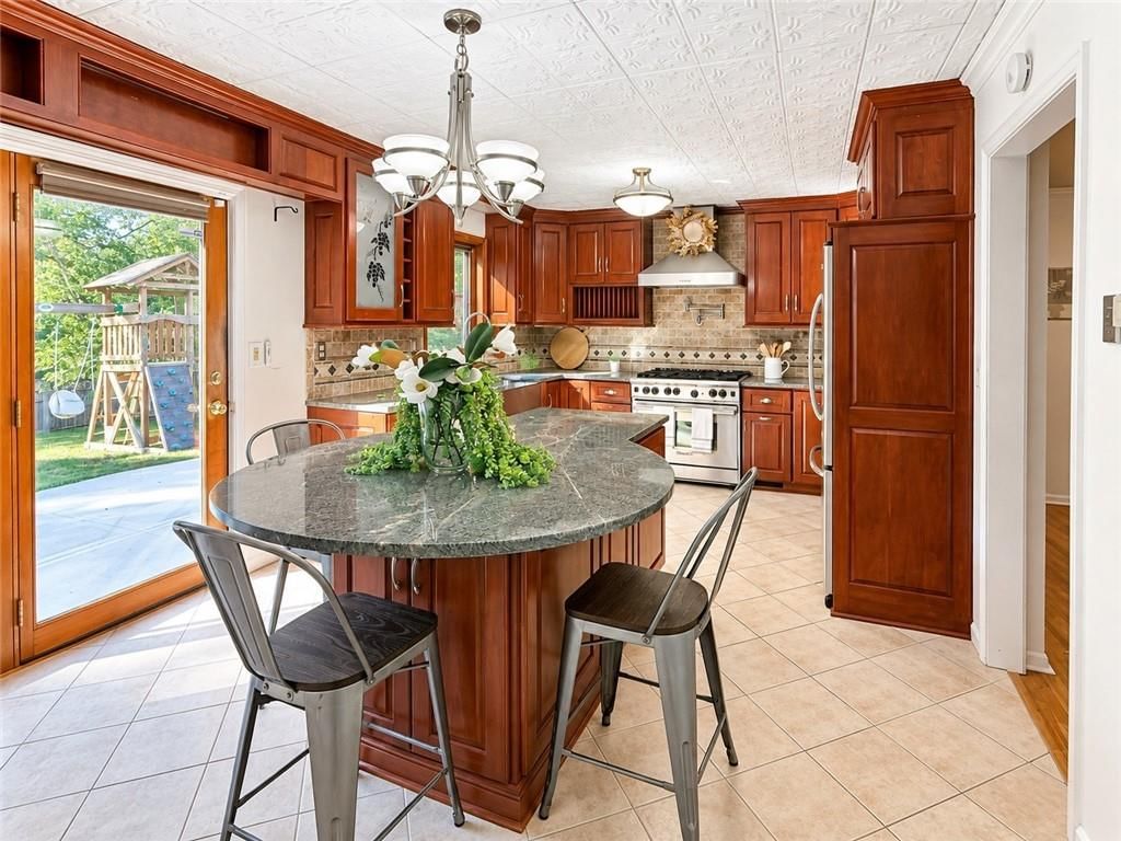 Photo 14 of 63 - 6112 N Strathbury Avenue, Kansas City, MO 64151
