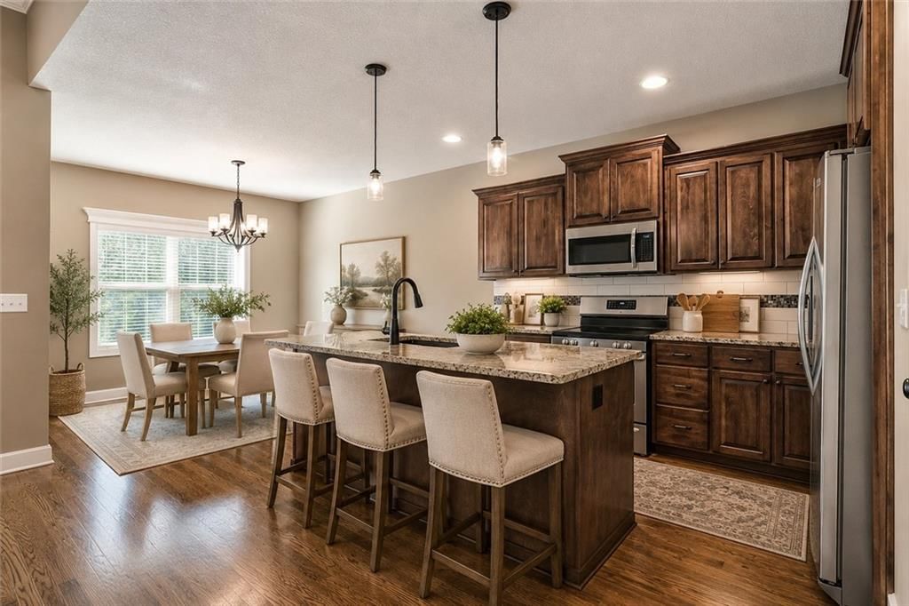 Photo 10 of 40 - 2003 Creek View Lane, Raymore, MO 64083