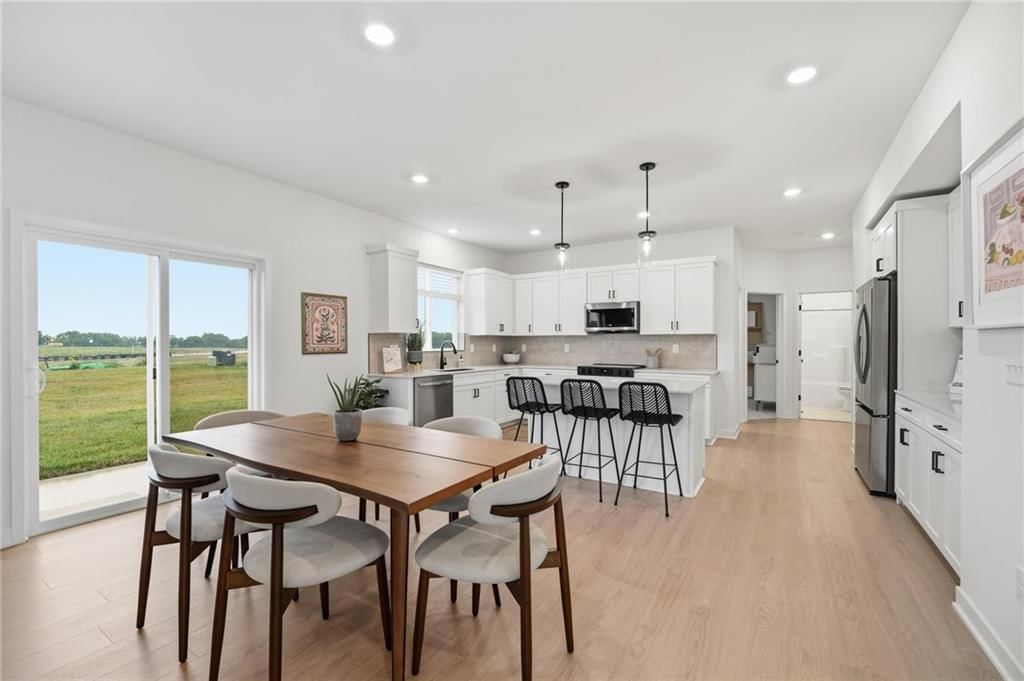 Photo 10 of 22 - 1521 Portsmouth Lane, Raymore, MO 64083