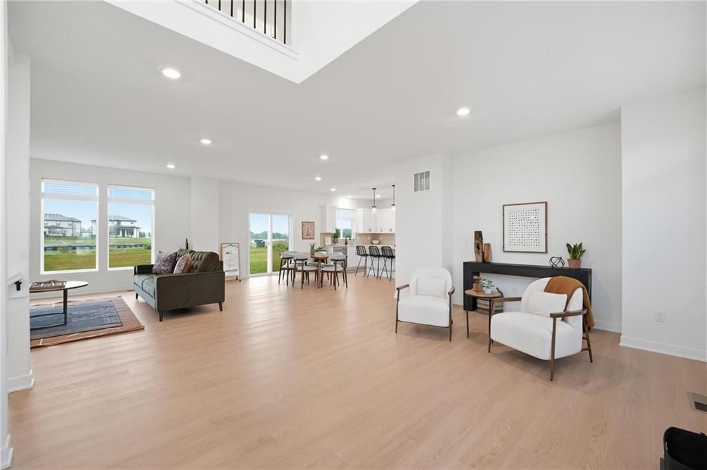 Photo 8 of 22 - 1521 Portsmouth Lane, Raymore, MO 64083