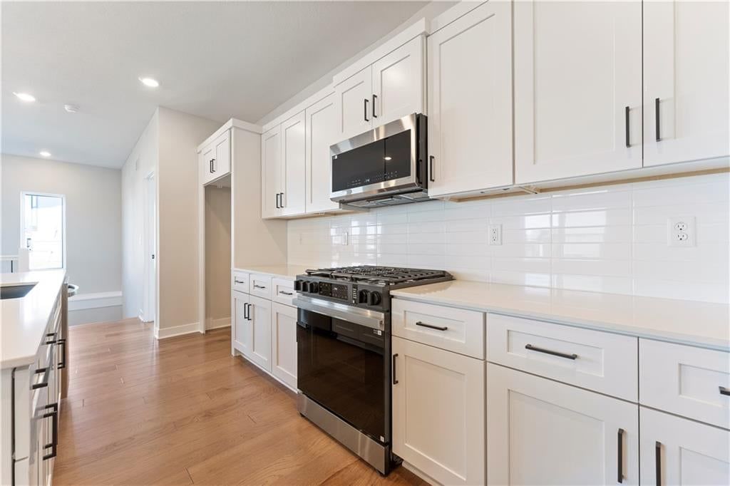 Photo 11 of 19, 1525 Portsmouth Lane, Raymore, MO 64083