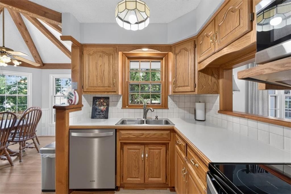 Tall ceilings, open floor plan and hardwood floors at 15738 W 148th Terrace, Olathe, KS 66062