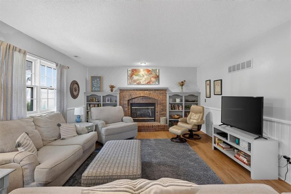 Fireplace and brick fireplace at 15738 W 148th Terrace, Olathe, KS 66062