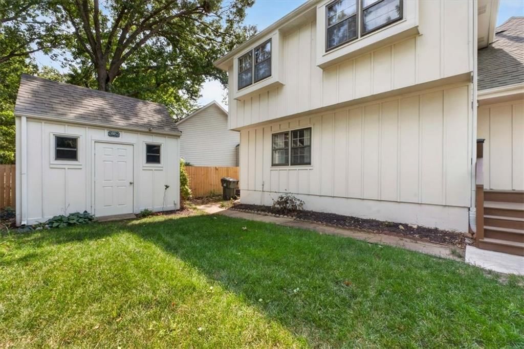 Big backyard, fenced yard and mature trees at 15738 W 148th Terrace, Olathe, KS 66062