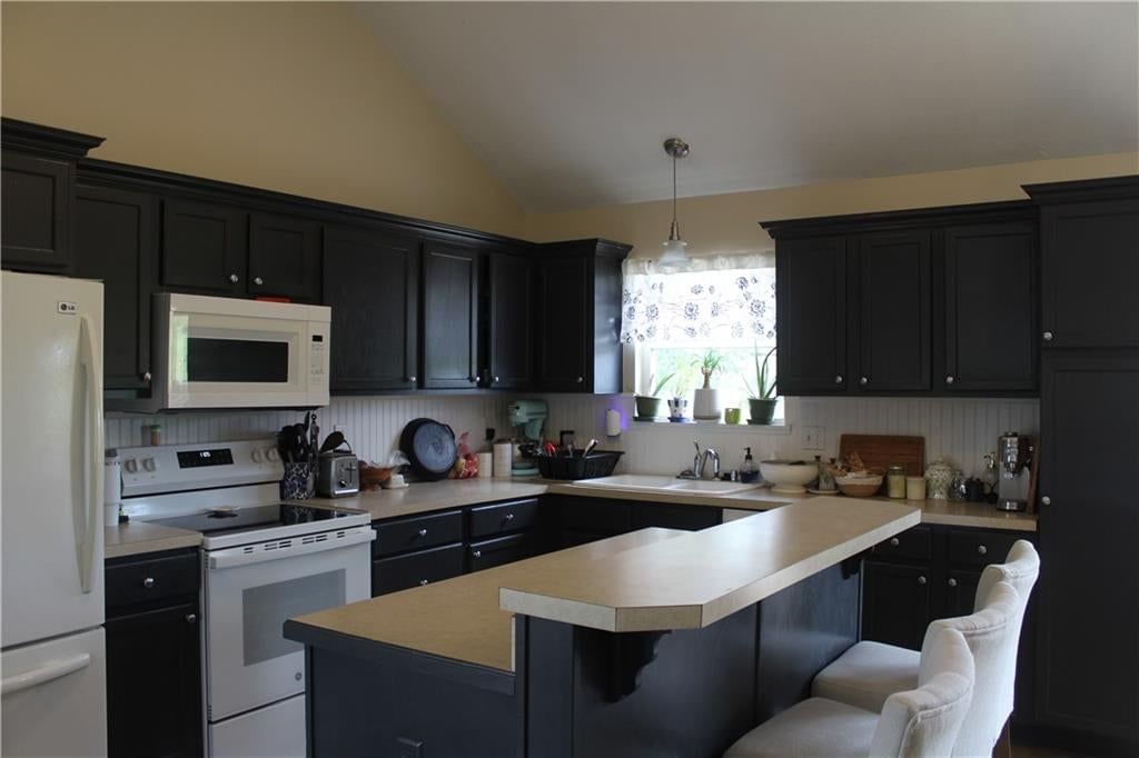 Photo 10 of 36 - 212 E Whispering Hills Boulevard, Lone Jack, MO 64070