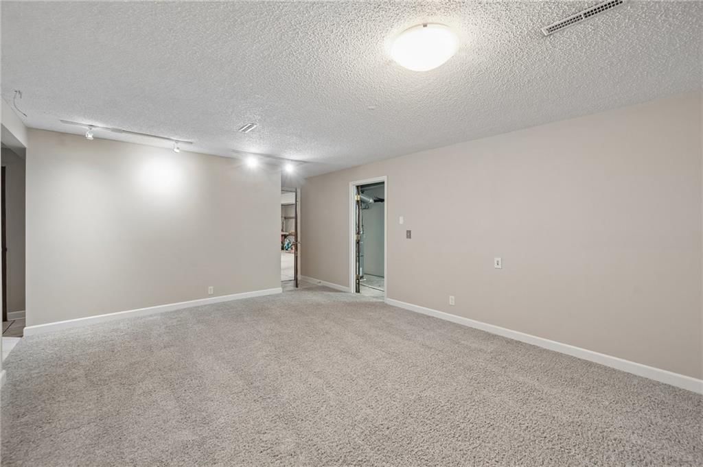 Fireplace and brick fireplace at 7317 NW 77th Terrace, Kansas City, MO 64152