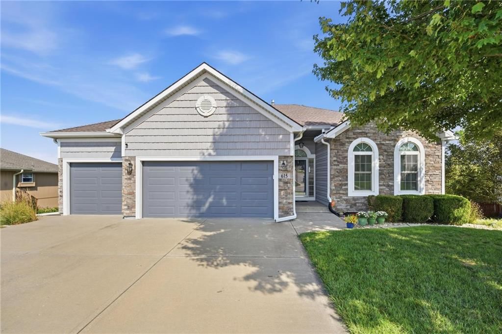 Photo 2 of 72 - 615 Johnston Parkway, Raymore, MO 64083