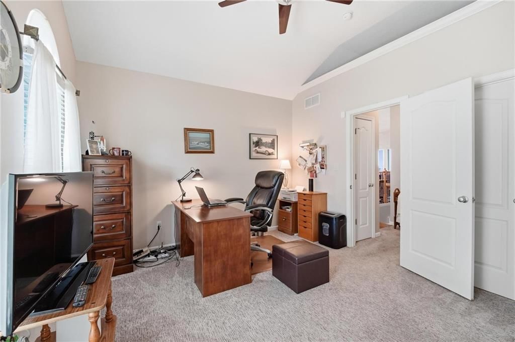 Photo 26 of 72 - 615 Johnston Parkway, Raymore, MO 64083