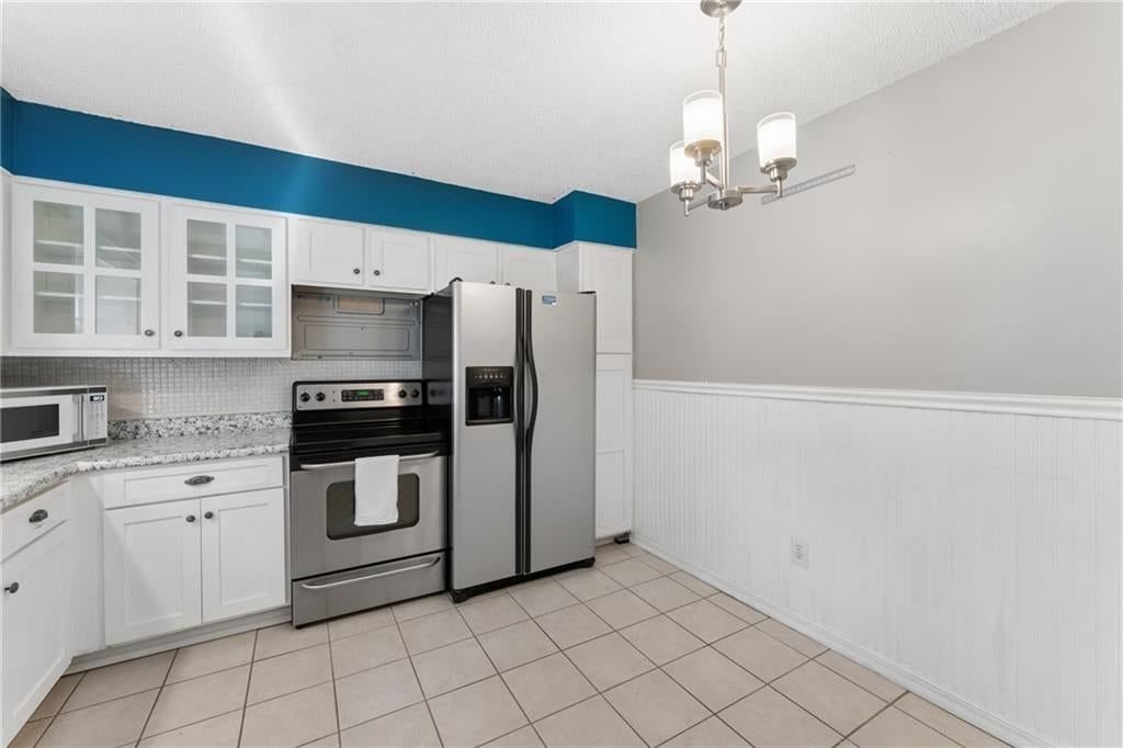 Photo 12 of 52 - 6024 N Kansas Avenue, Kansas City, MO 64119
