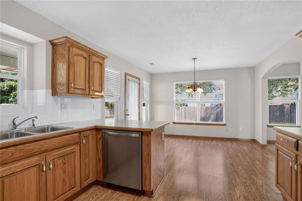Photo 8 of 21 - 1116 Granada Drive, Raymore, MO 64083