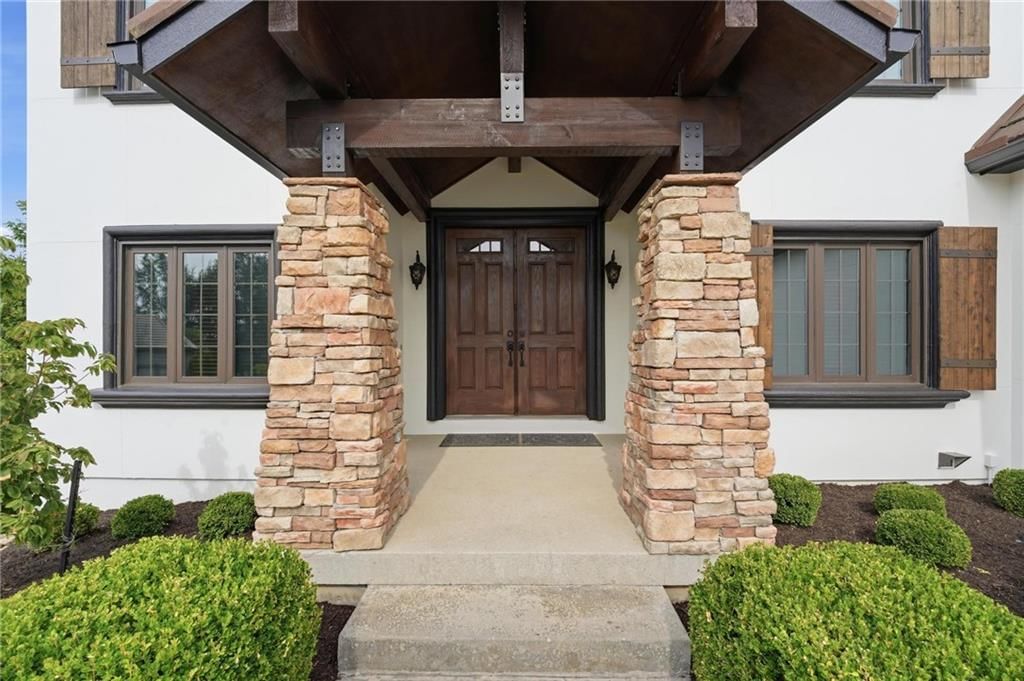 Covered front porch at 16199 Overbrook Lane, Stilwell, KS 66085