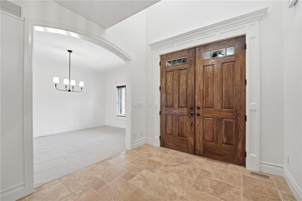 Tall ceilings and hardwood floors at 16199 Overbrook Lane, Stilwell, KS 66085