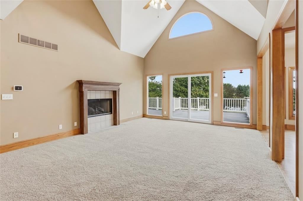 Hardwood floors, staircase and wood stair railing at 3930 W 223 Street, Bucyrus, KS 66013