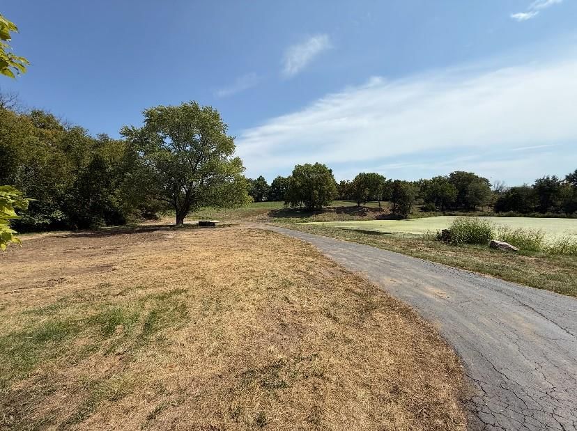 1551 NE Woods Chapel Road — photo 4