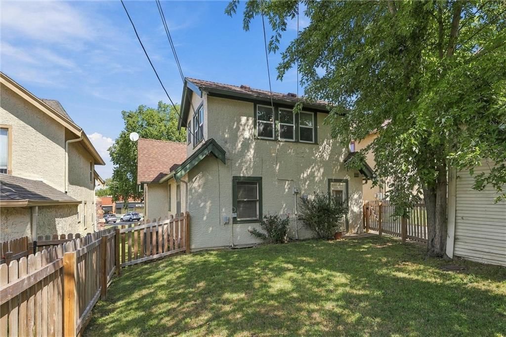 Screened porch and covered patio at 405 E Gregory Boulevard, Kansas City, MO 64131