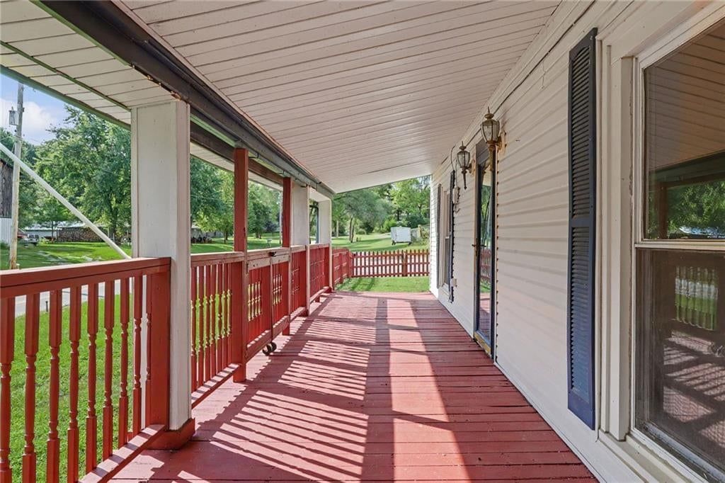 Deck, composite deck and covered patio at 23460 Interurban Road, Dearborn, MO 64439