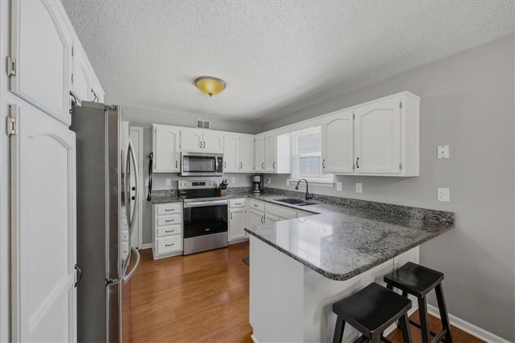 654 SE Canterbury Lane — photo 14
