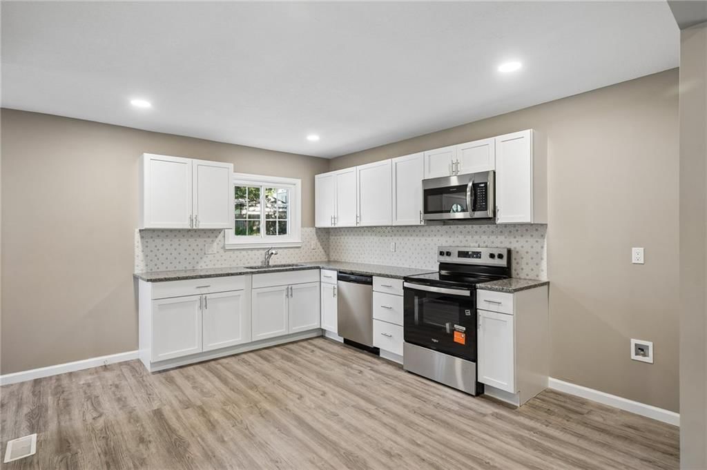 Photo 11 of 45 - 209 NE Hill Street, Kansas City, MO 64116