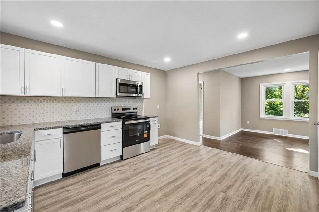 Photo 12 of 45 - 209 NE Hill Street, Kansas City, MO 64116