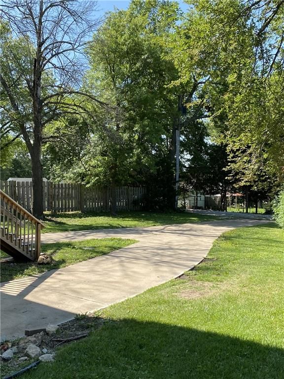 Fenced yard at 312 3rd Street, Belton, MO 64012