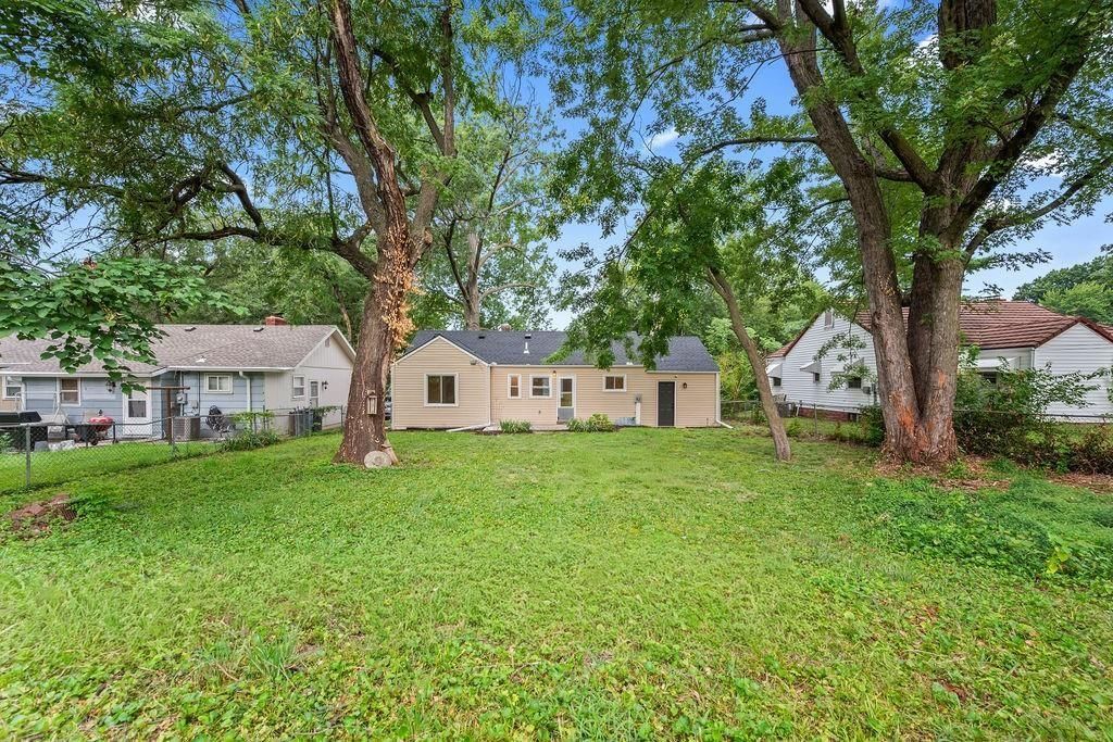 Mature trees, big backyard and flat lot at 3331 S Arlington Avenue, Independence, MO 64052
