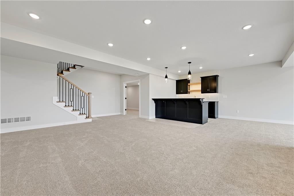 Finished basement and wet bar at 24980 W 98th Place, Lenexa, KS 66227