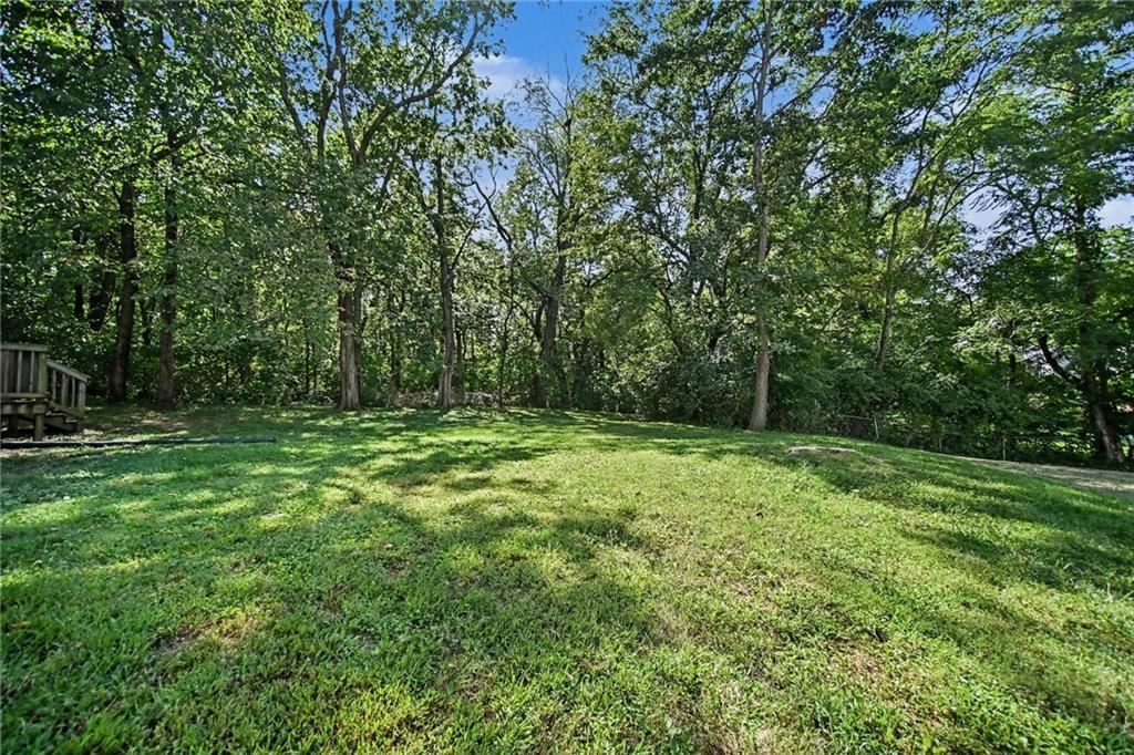 Big backyard and flat lot at 9038 Manning Avenue, Kansas City, MO 64138