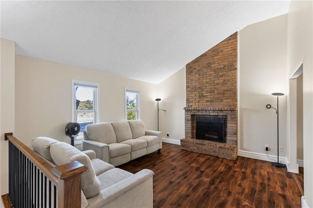 Fireplace and exposed brick wall at 8005 N Congress Avenue, Kansas City, MO 64152